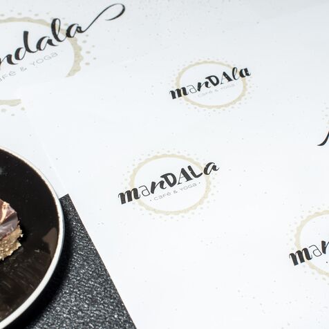 Verschiedene Entwürfe des Logos Mandala Café & Yoga in Oberstdorf