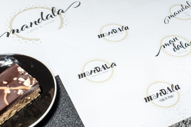 Verschiedene Entwürfe des Logos Mandala Café & Yoga in Oberstdorf